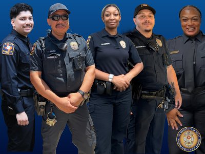 Police officers posed in uniformed