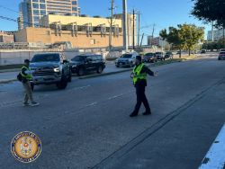 Police officers directing traffic with reflective vests