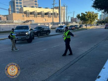 Police officers directing traffic with reflective vests