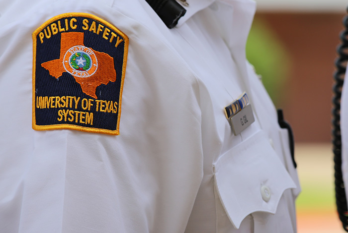 The uniform of a Public Safety Officer, with the arm patch displayed.